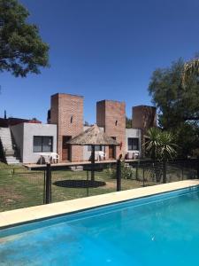 Πισίνα στο ή κοντά στο Aguaribay Apart