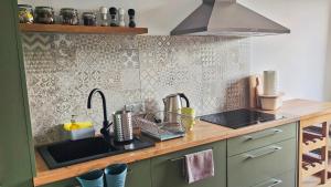 Kuchyňa alebo kuchynka v ubytovaní Apartamenty GÓRKA