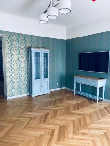 Imagem da galeria de Roze Republikas Apartments em Liepāja