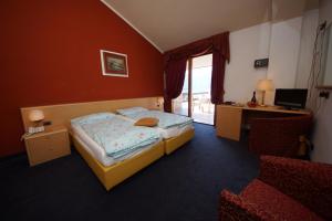 Katil atau katil-katil dalam bilik di Hotel Alpi