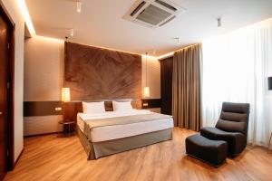 Hotel Tbilisi Tower客房内的一张或多张床位