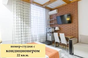 Телевизор и/или развлекательный центр в Отель Вуд Стрит Белорусская