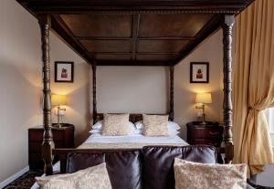 A bed or beds in a room at The Bayview 