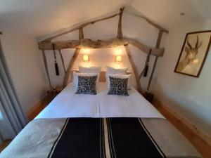 Katil atau katil-katil dalam bilik di LE CLOS DE L AGNEAU