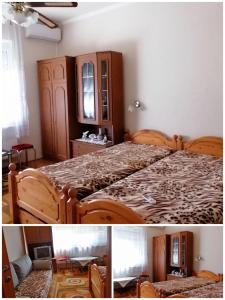 Schlafzimmer mit einem Bett und einem Holzschrank in der Unterkunft Vida vendégház in Hajdúszoboszló