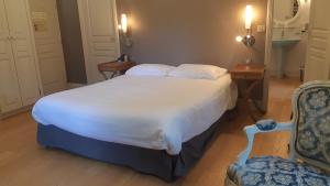 Кровать или кровати в номере La Source du Mont
