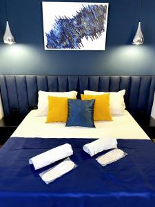 Postel nebo postele na pokoji v ubytování Hotel ULYSSES