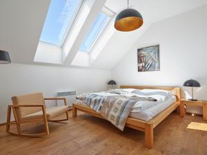 Postel nebo postele na pokoji v ubytování Apartmány Velká Morava