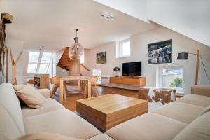 TV a/nebo společenská místnost v ubytování Apartmány Velká Morava