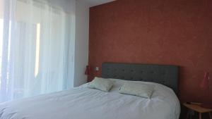 Postel nebo postele na pokoji v ubytování Magnifique T3 DUPLEX Vue Panoramique Golfe Ajaccio