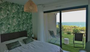Postel nebo postele na pokoji v ubytování Magnifique T3 DUPLEX Vue Panoramique Golfe Ajaccio