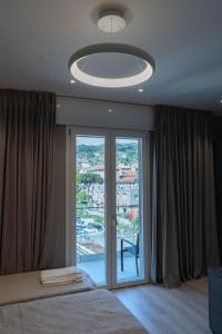 Кровать или кровати в номере Hotel Graziella