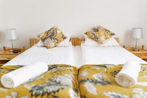 Posteľ alebo postele v izbe v ubytovaní Apartament Dwie Doliny