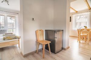 Kuchyňa alebo kuchynka v ubytovaní Apartament Dwie Doliny + 12 fotografií