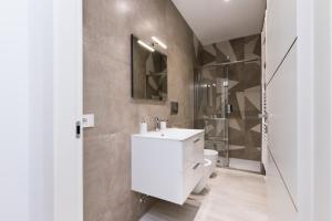 A bathroom at MagnoliaApartments - 18A Visconti Duomo