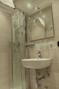 Ванная комната в Hotel Graziella