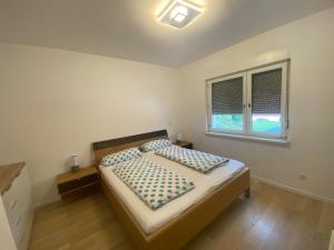 Postel nebo postele na pokoji v ubytování Apartment mit Parkblick