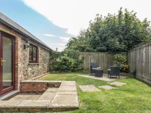 Zahrada ubytování Woodpecker Cottage