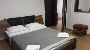 Ένα ή περισσότερα κρεβάτια σε δωμάτιο στο Hotel Chubu