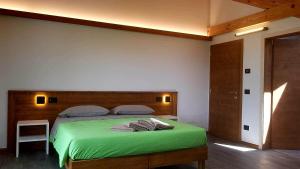 A bed or beds in a room at Camping Canè in Fiore