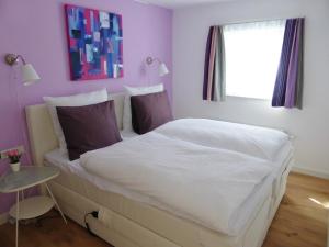Katil atau katil-katil dalam bilik di Villa Witte Lelie