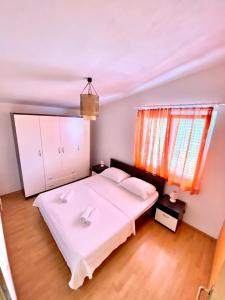Posteľ alebo postele v izbe v ubytovaní Apartments Bartol with Free Bikes and Great Local Food