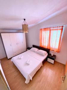 Posteľ alebo postele v izbe v ubytovaní Apartments Bartol with Free Bikes and Great Local Food