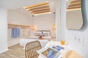 Postel nebo postele na pokoji v ubytování Naxian Spirit Inn + 37 fotografií