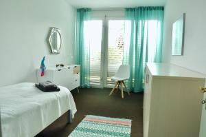 Voodi või voodid majutusasutuse Minusio-Locarno: Navengana Apt.4 toas