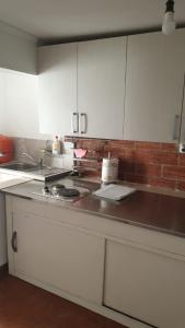 Kuchyň nebo kuchyňský kout v ubytování Milović apartmani