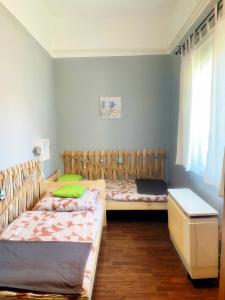 Posteľ alebo postele v izbe v ubytovaní Pihi-Lak Apartman Siófok
