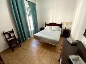Postel nebo postele na pokoji v ubytování Apartamento Hostal Mellizo