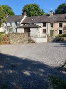 a large house with a driveway in front of it at Glyncoch Aberporth in Aberporth