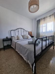 Ένα ή περισσότερα κρεβάτια σε δωμάτιο στο Lovely 4 bed flat