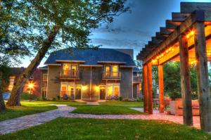 a home with a pathway leading to the front yard at Fairholm Boutique Inns in Charlottetown