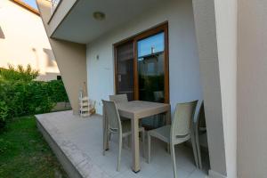 Balkón nebo terasa v ubytování Paradise Town Villa Beliza