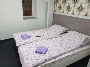 Krevet ili kreveti u jedinici u okviru objekta SOBE ROYAL 2 Šabac