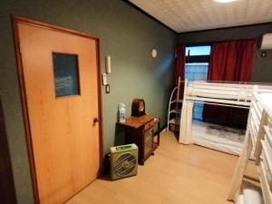 Kuchyň nebo kuchyňský kout v ubytování 静かに過ごす古民家ステイ Staying quietly in renovated house
