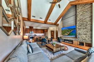a living room with a couch and a fireplace at Zalanta 328 - HVH3 in South Lake Tahoe