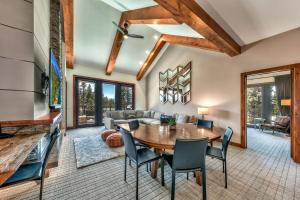 a dining room and living room with a table and chairs at Zalanta 328 - HVH3 in South Lake Tahoe