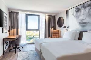 Voodi või voodid majutusasutuse Radisson Blu Conference Hotel, Düsseldorf toas