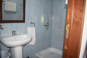 Ванная комната в Casa das hortências