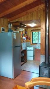 Köök või kööginurk majutusasutuses Dos Oregones Caburgua