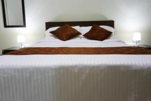 Voodi või voodid majutusasutuse Hotel Cafetto toas