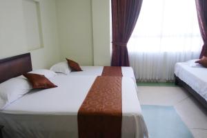 Voodi või voodid majutusasutuse Hotel Cafetto toas
