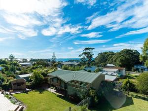 an aerial view of a house with a yard at Daybreak by Experience Jervis Bay in Vincentia