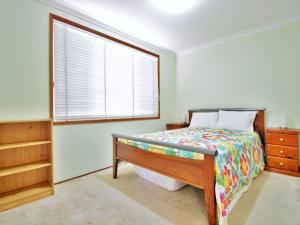 Ένα ή περισσότερα κρεβάτια σε δωμάτιο στο Peace by the Beach by Experience Jervis Bay +3 φωτογραφίες