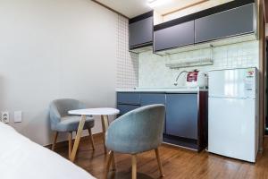 Kuchyň nebo kuchyňský kout v ubytování Hotel Amor