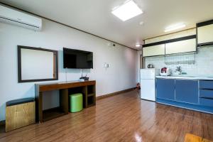 Kuchyň nebo kuchyňský kout v ubytování Hotel Amor