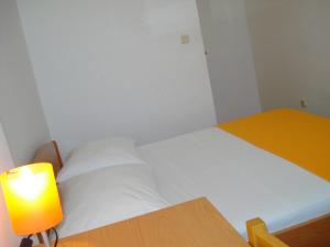 Una habitación en Apartments Nikolas